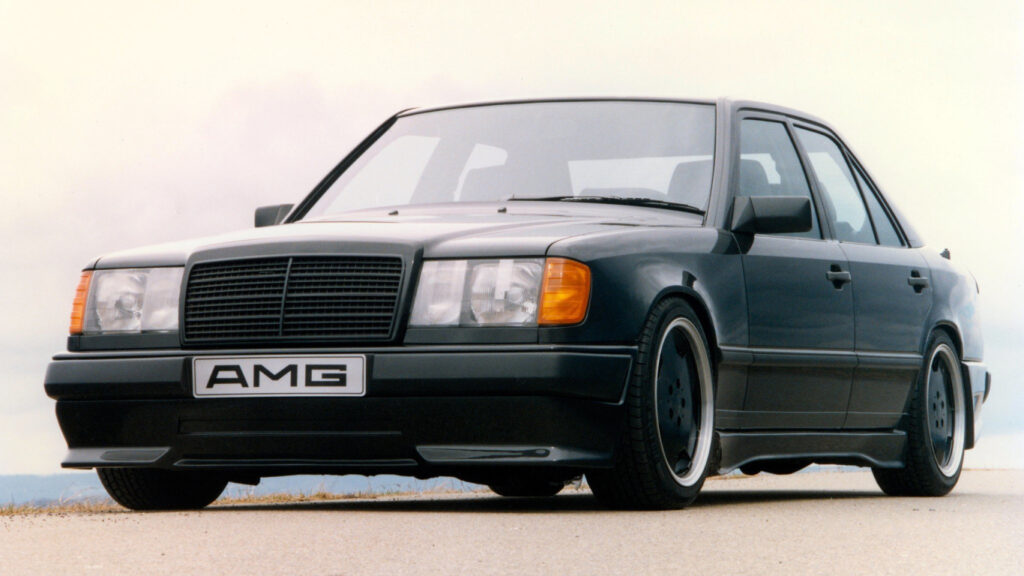 Black Mercedes-Benz AMG Hammer in motion, highlighting its powerful performance and iconic design.