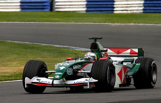 Christian Klien driving his Jaguar F1 car around silverstone