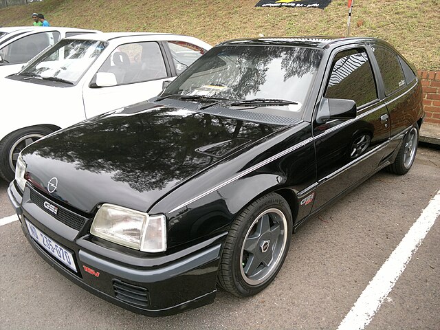 Classic Opel Kadett E GSi, showcasing its sleek, aerodynamic design and legendary performance, a true icon of the 80s hot hatch era